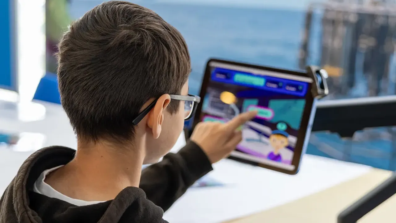 OpenDay2025 Child interacting with screen